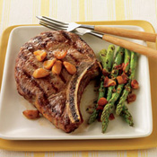 Bone-In Rib Eye Steaks with Sweet, Pan-Roasted Garlic