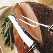 Herb-Rubbed Rotisserie Ham with Southern Comfort Mop