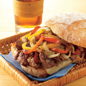 Philly-Style Steak Sandwiches with Grilled Onions and Provolone